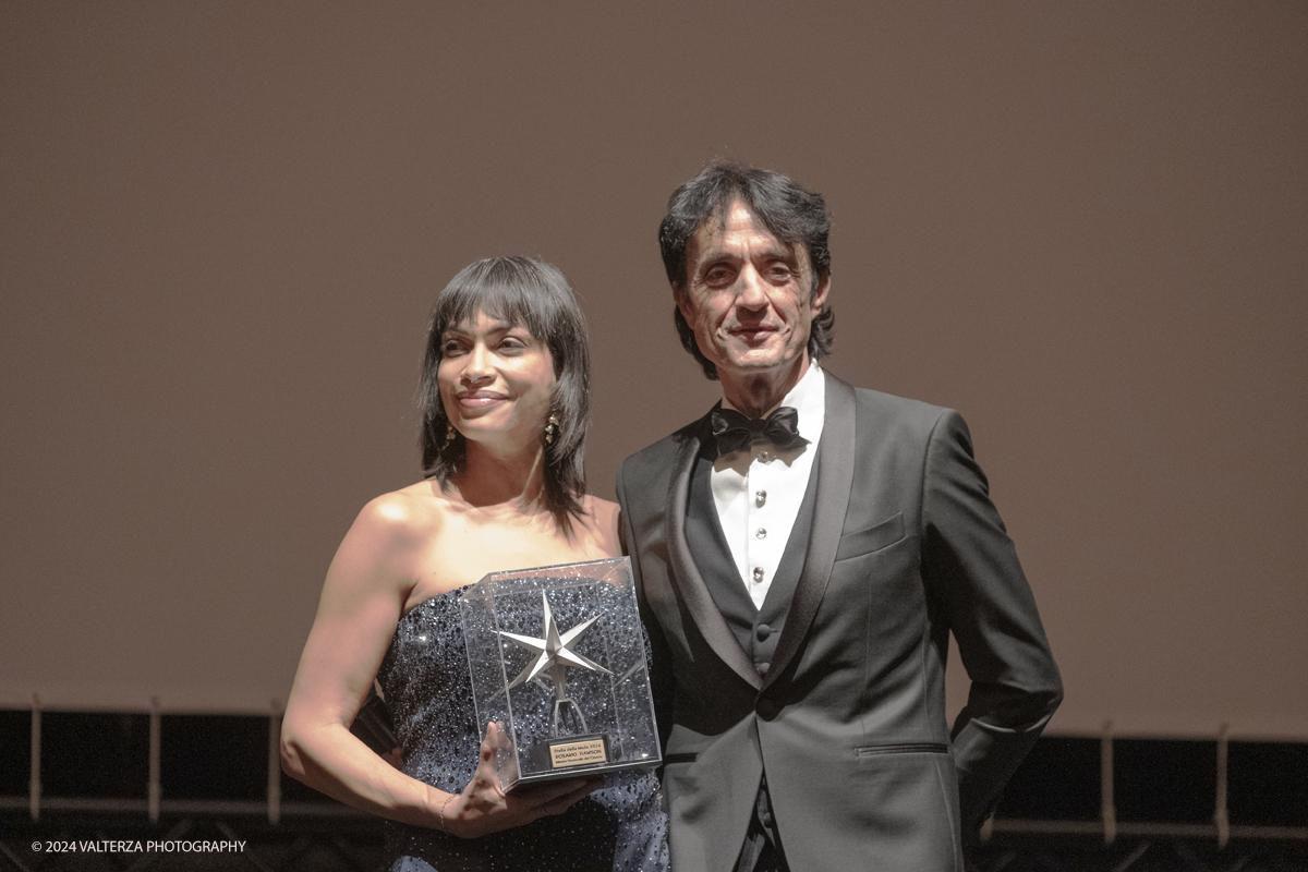_DSF4479.jpg - TURIN, ITALY - NOVEMBER 22:  Rosario Dawson , with Giulio Bove, attend the 42nd Torino Film Festival 2024 Opening Ceremony and receives the Stella della Mole award