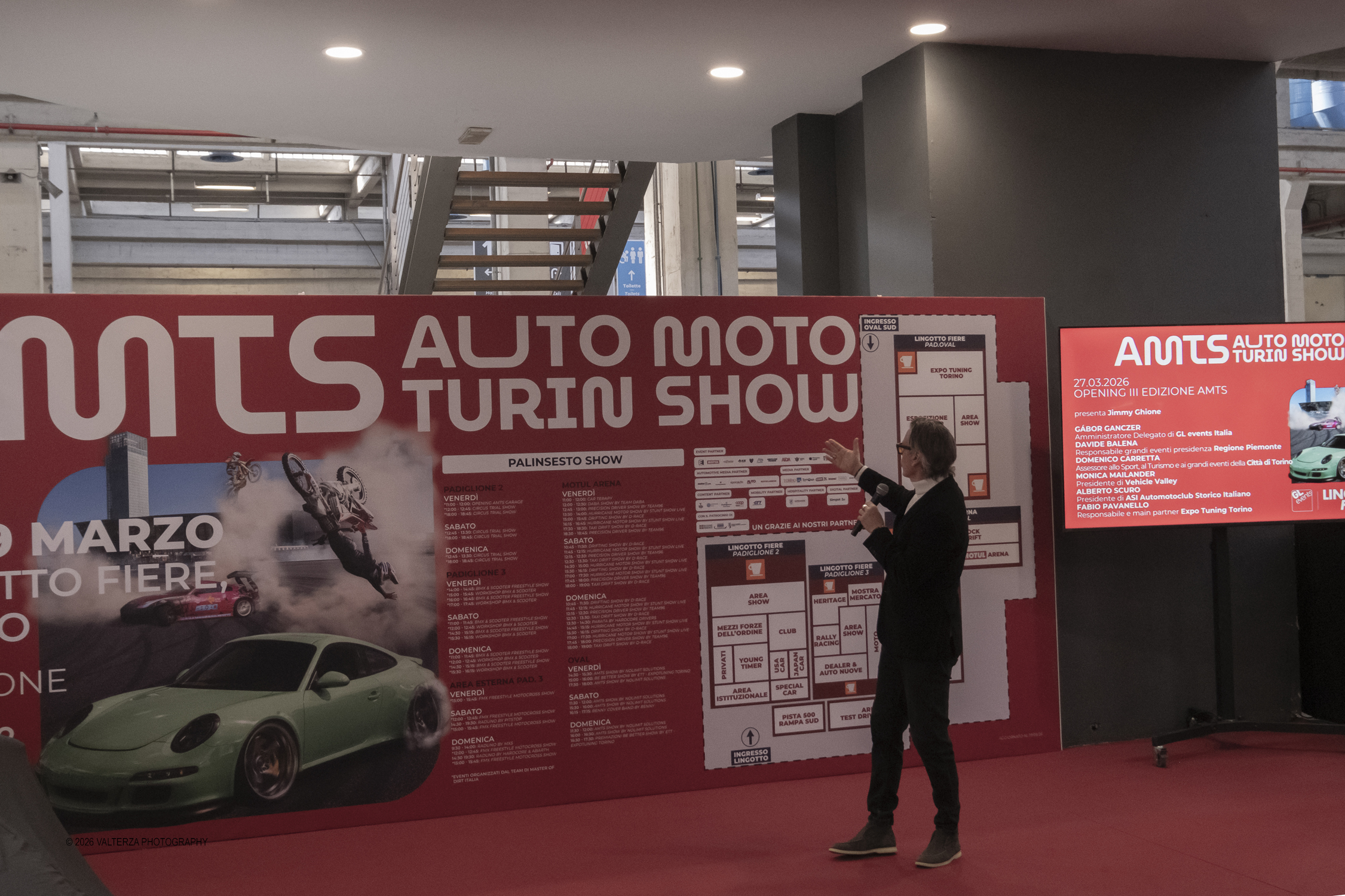 _DSF6571.jpg - 27/03/2026/. Torino.  Ad AMTS , Auto Moto Turin Show, lo spettacolo Ã¨ protagonista per tutto il weekend! 3 arene indoor e 2 piste outdoor dedicate agli show. Spettacoli di freestyle, drifting e stunt con piloti e rider professionisti. Nella foto  Jimmy Ghione di Striscia la Notizia apre l'inaugurazione della mostra con le interviste a Gabor Gangzer AD di GL  events Italia, Davide Balena responsabile grandi eventi Regione Piemonte, Domenico Carretta Assesssore Grandi eventi cittÃ  di Torino, Monica MailanderPresidente Vehicle Vallry, Alberto Scuro Presidente ASI, Fabio Pavanello Expo Tuning Torino   partecipanti al taglio del nastro