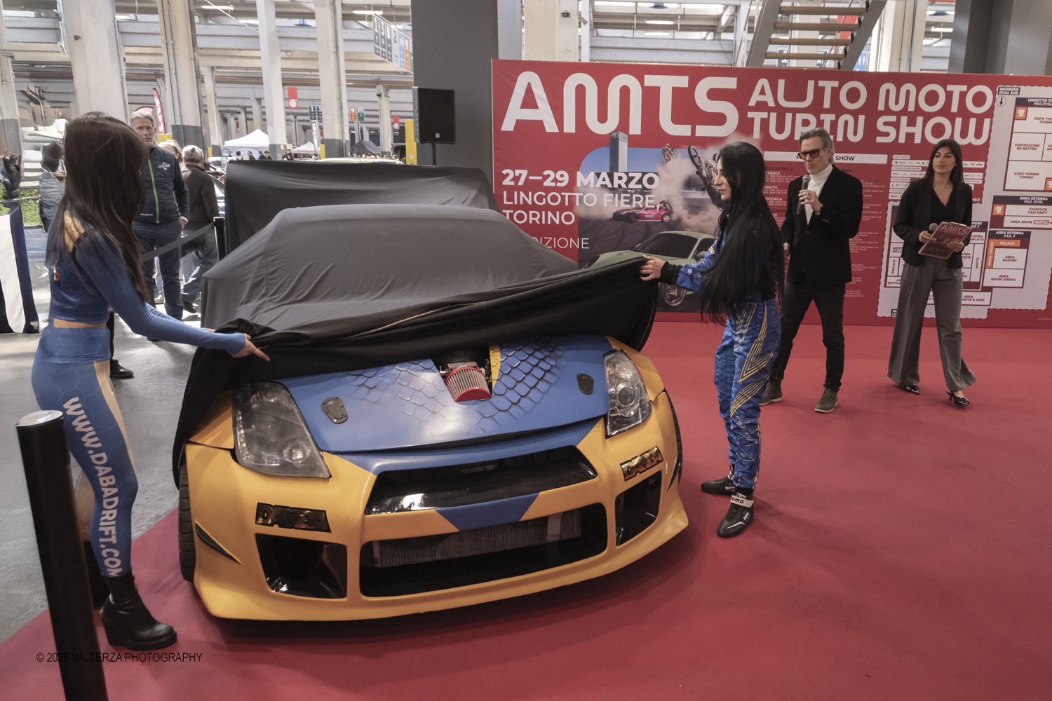 _DSF6724.jpg - 27/03/2026/. Torino.  Ad AMTS , Auto Moto Turin Show, lo spettacolo Ã¨ protagonista per tutto il weekend! 3 arene indoor e 2 piste outdoor dedicate agli show. Spettacoli di freestyle, drifting e stunt con piloti e rider professionisti. Nella foto nell'occasione viene svelata la nuova mazda con la livrea della DABADRIFT