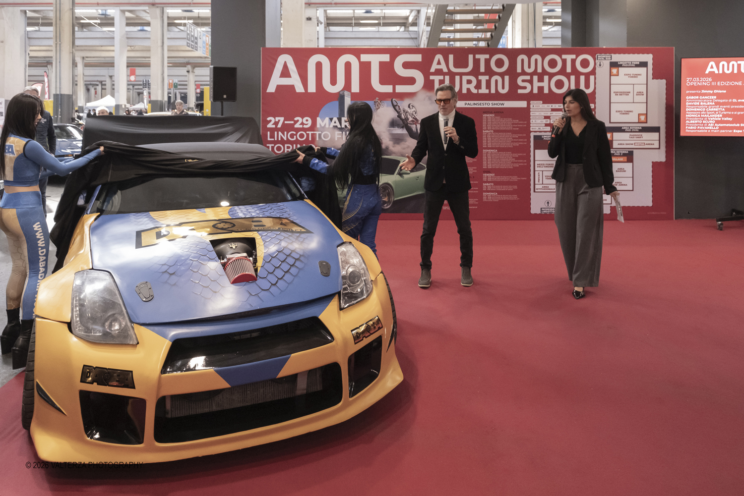 _DSF6759.jpg - 27/03/2026/. Torino.  Ad AMTS , Auto Moto Turin Show, lo spettacolo Ã¨ protagonista per tutto il weekend! 3 arene indoor e 2 piste outdoor dedicate agli show. Spettacoli di freestyle, drifting e stunt con piloti e rider professionisti. Nella foto nell'occasione viene svelata la nuova mazda con la livrea della DABADRIFT