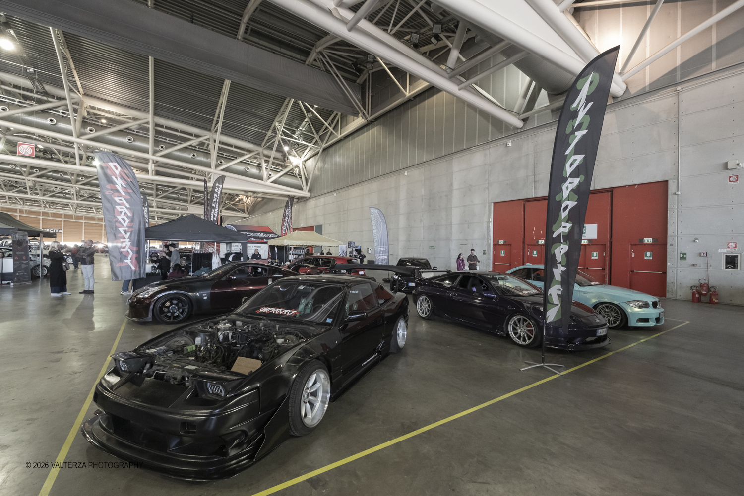 _DSF7103.jpg - 27/03/2026/. Torino.  Ad AMTS , Auto Moto Turin Show, lo spettacolo Ã¨ protagonista per tutto il weekend! 3 arene indoor e 2 piste outdoor dedicate agli show. Spettacoli di freestyle, drifting e stunt con piloti e rider professionisti. Nella foto parte dell'allestimento dell'OVAL dedicato alla elaborazione nel settore Auto e Moto  (Tuning)