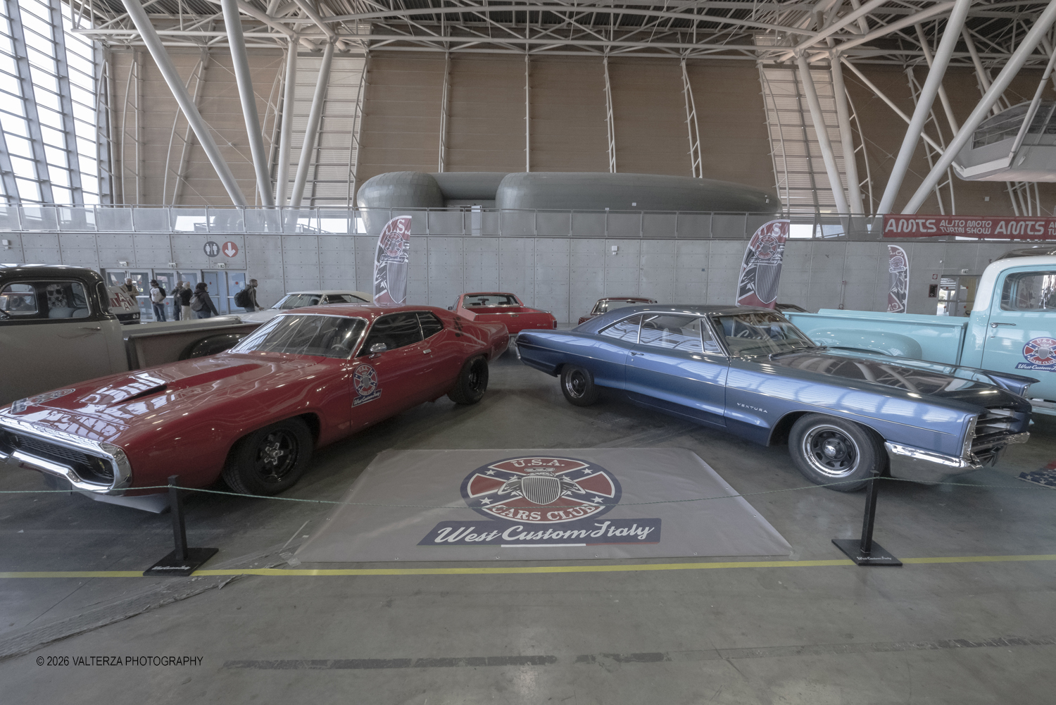 _DSF7222.jpg - 27/03/2026/. Torino.  Ad AMTS , Auto Moto Turin Show, lo spettacolo Ã¨ protagonista per tutto il weekend! 3 arene indoor e 2 piste outdoor dedicate agli show. Spettacoli di freestyle, drifting e stunt con piloti e rider professionisti. Nella foto lo stand  di West Costum Italy ( USA Cars Club) all' OVAL