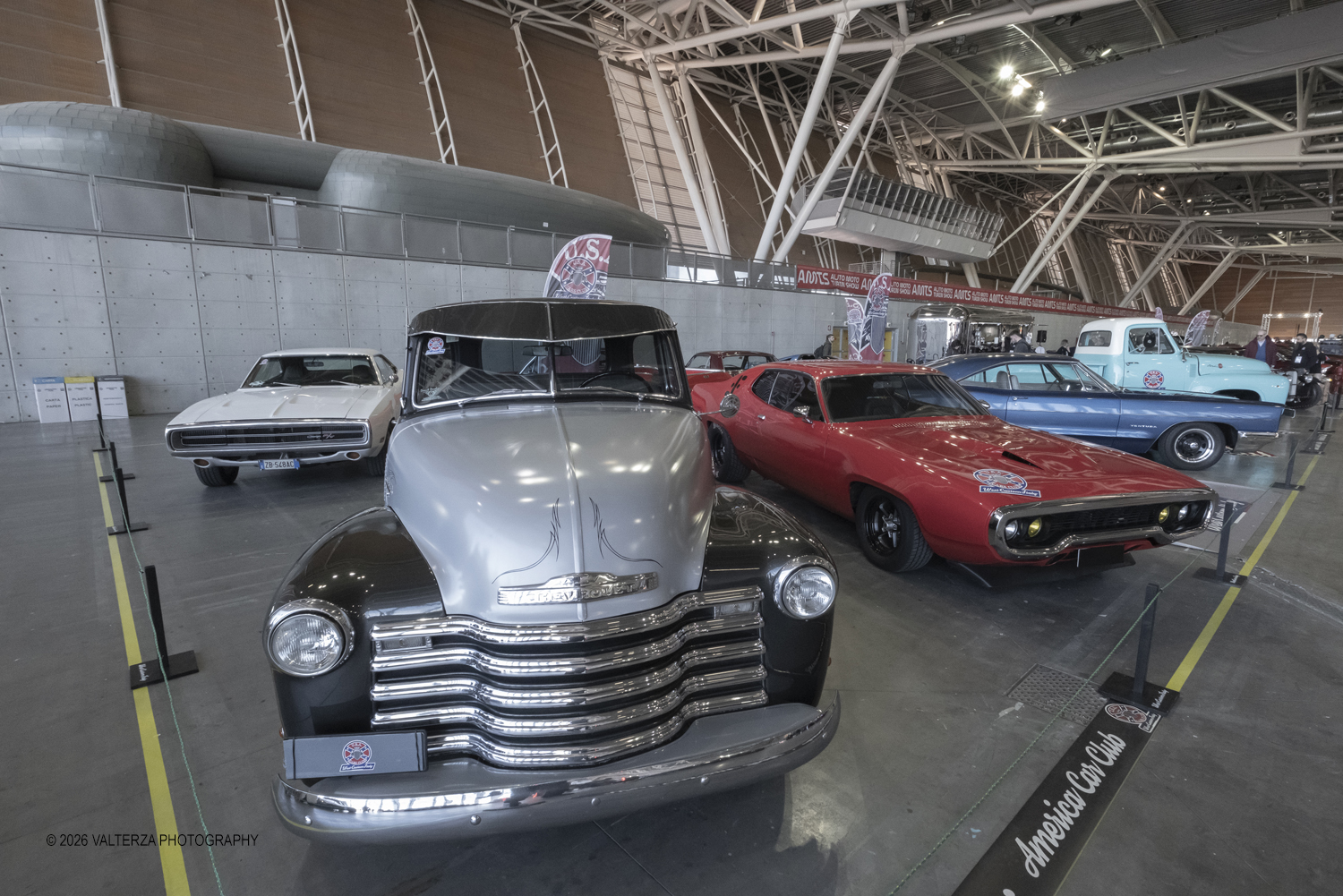 _DSF7229.jpg - 27/03/2026/. Torino.  Ad AMTS , Auto Moto Turin Show, lo spettacolo Ã¨ protagonista per tutto il weekend! 3 arene indoor e 2 piste outdoor dedicate agli show. Spettacoli di freestyle, drifting e stunt con piloti e rider professionisti. Nella foto lo stand  di West Costum Italy ( USA Cars Club) all' OVAL