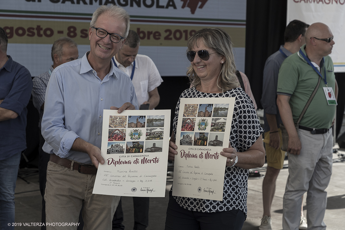 _G3I3689.jpg - 01/09/2019. Carmagnola. TO. Concorso del Peperone  Riservato ai produttori dellâ€™area di coltivazione del Peperone di Carmagnola, si premiano i migliori esemplari i dei quattro ecotipi locali: quadrato, lungo o corno di bue, trottola e tumaticot. Nella foto un momento della premiazione dei vincitori il concorso del Peperone