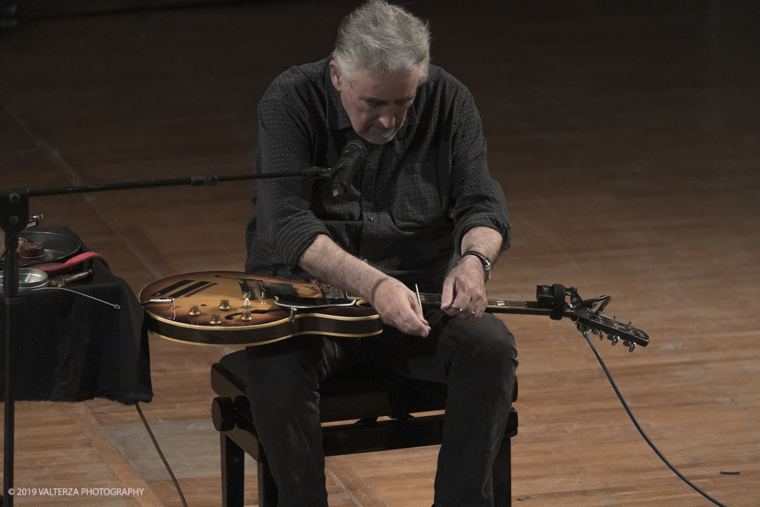 _G3I2992.jpg - 28/04/2019.Torino,.Attivo da oltre cinquantâ€™anni nei piuÌ€ disparati contesti musicali, Fred Frith eÌ€ un vero pioniere della chitarra elettrica, fin dai tempi di gruppi avant rock come Henry Cow o Massacre (con Bill Laswell). Come improvvisatore radicale ha suonato con figure del calibro di Robert Wyatt o John Zorn e come compositore ha visto suoi lavori interpretati da affermati ensemble di musica contemporanea. Nella foto Fred Frith nella esibizione "solo electric guitar" sul palco del conservatorio Giuseppe Verdi.