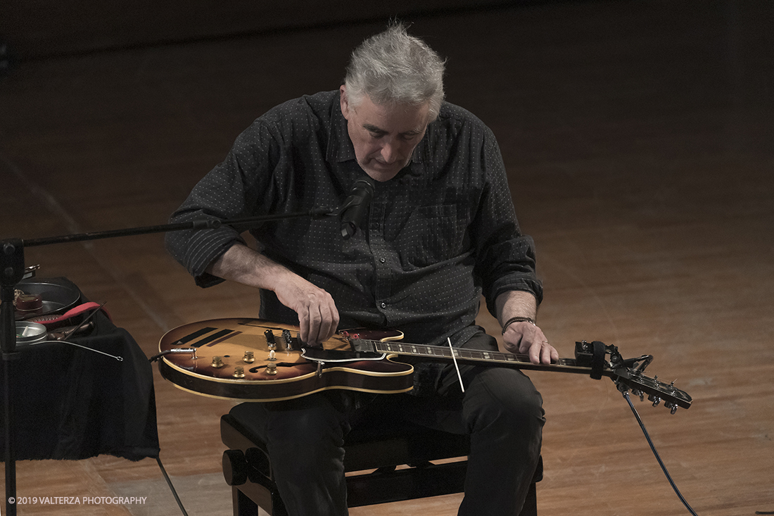 _G3I2997.jpg - 28/04/2019.Torino,.Attivo da oltre cinquantâ€™anni nei piuÌ€ disparati contesti musicali, Fred Frith eÌ€ un vero pioniere della chitarra elettrica, fin dai tempi di gruppi avant rock come Henry Cow o Massacre (con Bill Laswell). Come improvvisatore radicale ha suonato con figure del calibro di Robert Wyatt o John Zorn e come compositore ha visto suoi lavori interpretati da affermati ensemble di musica contemporanea. Nella foto Fred Frith nella esibizione "solo electric guitar" sul palco del conservatorio Giuseppe Verdi.