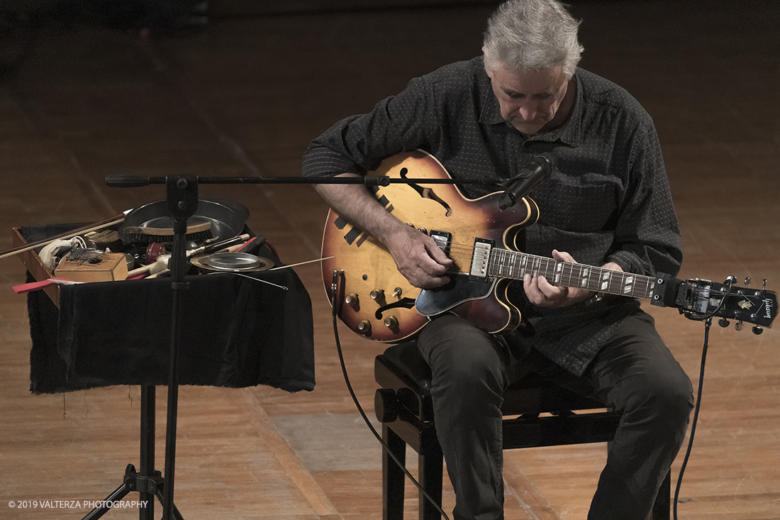 _G3I3236.jpg - 28/04/2019.Torino,.Attivo da oltre cinquantâ€™anni nei piuÌ€ disparati contesti musicali, Fred Frith eÌ€ un vero pioniere della chitarra elettrica, fin dai tempi di gruppi avant rock come Henry Cow o Massacre (con Bill Laswell). Come improvvisatore radicale ha suonato con figure del calibro di Robert Wyatt o John Zorn e come compositore ha visto suoi lavori interpretati da affermati ensemble di musica contemporanea. Nella foto Fred Frith nella esibizione "solo electric guitar" sul palco del conservatorio Giuseppe Verdi.