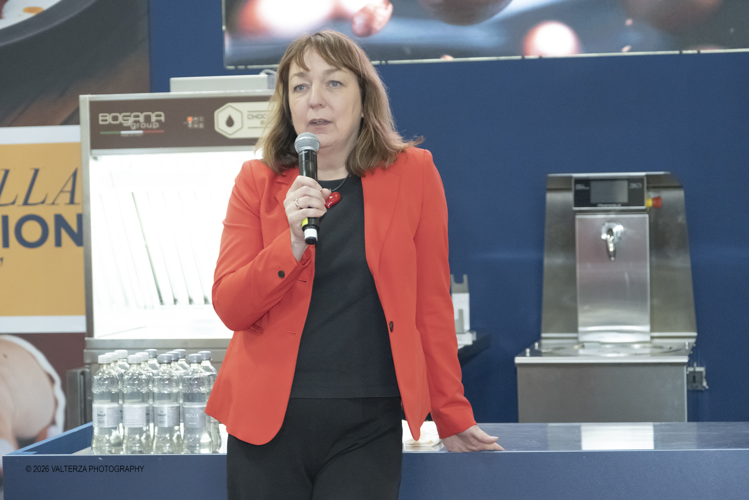 DSCF3342.jpg - 15/03/2026. Torino. Nel Padiglione 3 del Lingotto Fiere di Torino si svolge la terza edizione di Horeca Expoforum. Con oltre 300 brand italiani e internazionali presenti e circa 100 eventi in tre giorni, Horeca Expoforum si conferma piattaforma di riferimento per ristorazione, hotellerie e food service, punto di incontro fra innovazione, formazione e networking. Al centro dellâ€™inaugurazione il tema dello spreco alimentare. Nella foto Krisztina Szilvasi di GL events Italia apre la cerimonia di presentazione