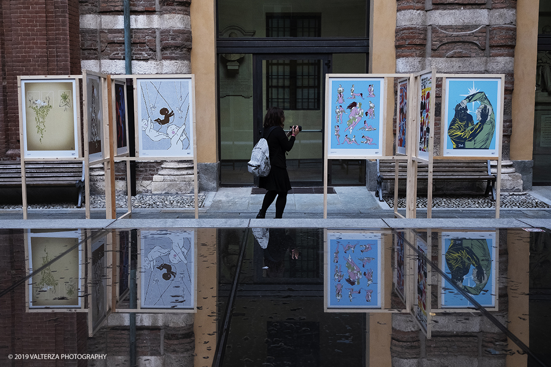 _DSF5964.jpg - 02/10/2019. Torino. Just Humans, 100 illustratori sono stati invitati a condividere la propria visione sul tema dellâ€™integrazione. 50 di loro arrivano dal panorama della scena locale ed hanno coinvolto altrettanti colleghi di provenienza nazionale ed internazionale a lavorare sul tema. Nella foto le opere di vari autori in mostra nel cortile interno del Museo Egizio