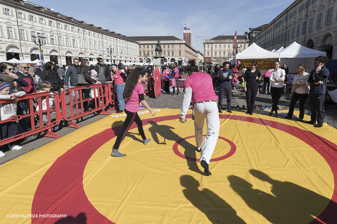 _G3I6777.jpg - 03-03-2019. Torino. â€œJust The Woman I am â€� Ã¨ una corsa/camminata podistica non competitiva di 6 km per sostenere la ricerca universitaria sul cancro: uomini e donne correranno fianco a fianco a sostegno della ricerca universitaria e della diffusione di una maggiore consapevolezza di sÃ© per un corretto stile di vita.  In questa giornata non c'Ã¨ solo la corsa, ma anche un fitto programma di eventi in piazza, non esclusivamente sportivi. Nella foto l'area riservata agli eventi per i giovanissimi.