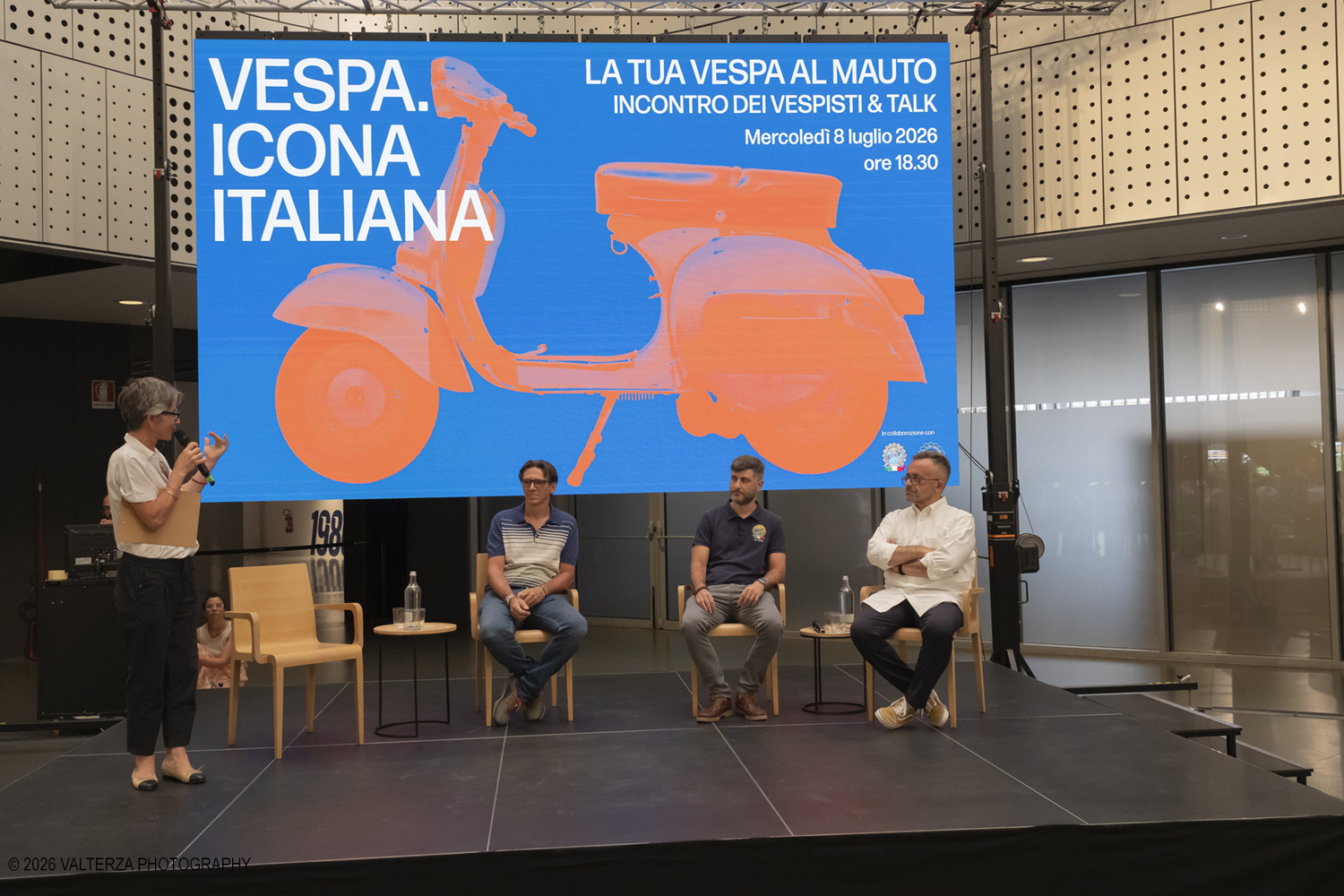 _DSF6280.jpg - 08/07/2026. Torino. In occasione della mostra VESPA. ICONA ITALIANA, il Museo Nazionale dellâ€™Automobile accoglie tutti i vespisti a vivere unâ€™esperienza esclusiva: per una sera la Piazza coperta del MAUTO ospita le Vespa dei partecipanti, che avranno lâ€™opportunitÃ  unica di esporre il proprio mezzo allâ€™interno del Museo, diventando protagonisti delle celebrazioni dedicate agli 80 anni di unâ€™autentica icona del design e della mobilitÃ  italiana. Nella foto un momento del Talk con Rino Drogo Curatore della mostra, Roberto Donati direttore storico culturale del Vespa Club dâ€™Italia, Marco Fumagalli collezionista titolare del materiale in mostra e imprenditore, Lorenza Bravetta Direttrice del MAUTO