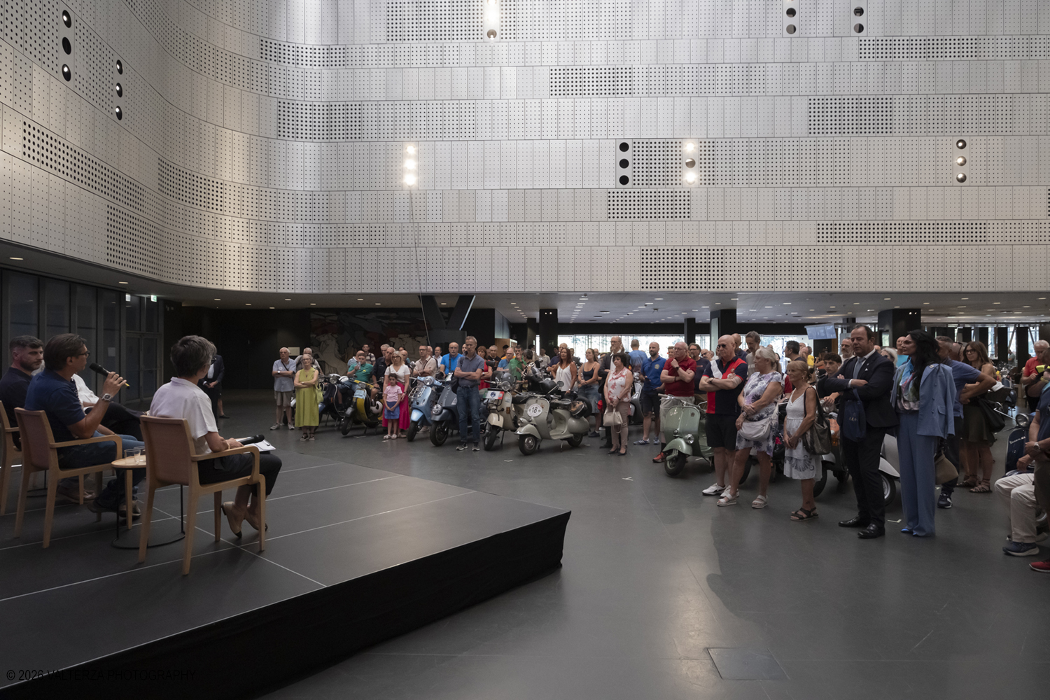 _DSF7863.jpg - 08/07/2026. Torino. In occasione della mostra VESPA. ICONA ITALIANA, il Museo Nazionale dellâ€™Automobile accoglie tutti i vespisti a vivere unâ€™esperienza esclusiva: per una sera la Piazza coperta del MAUTO ospita le Vespa dei partecipanti, che avranno lâ€™opportunitÃ  unica di esporre il proprio mezzo allâ€™interno del Museo, diventando protagonisti delle celebrazioni dedicate agli 80 anni di unâ€™autentica icona del design e della mobilitÃ  italiana. Nella foto un momento del Talk con Rino Drogo Curatore della mostra, Roberto Donati direttore storico culturale del Vespa Club dâ€™Italia, Marco Fumagalli collezionista titolare del materiale in mostra e imprenditore, Lorenza Bravetta Direttrice del MAUTO