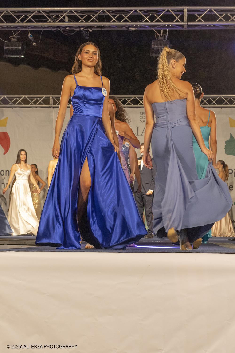 _G5A6567.jpg - 08/08/2026. Giaveno . Finale Regionale di Miss Cinema Piemonte e Valle d'Aosta nonchÃ© lâ€™elezione di Miss sport Givova e Miss Giaveno che ha visto trionfare rispettivamente Carlotta Anguilano, Nicole Medini, e Martina Viglierco. Nella foto un momento della sfilata delle concorrenti in abito da sera