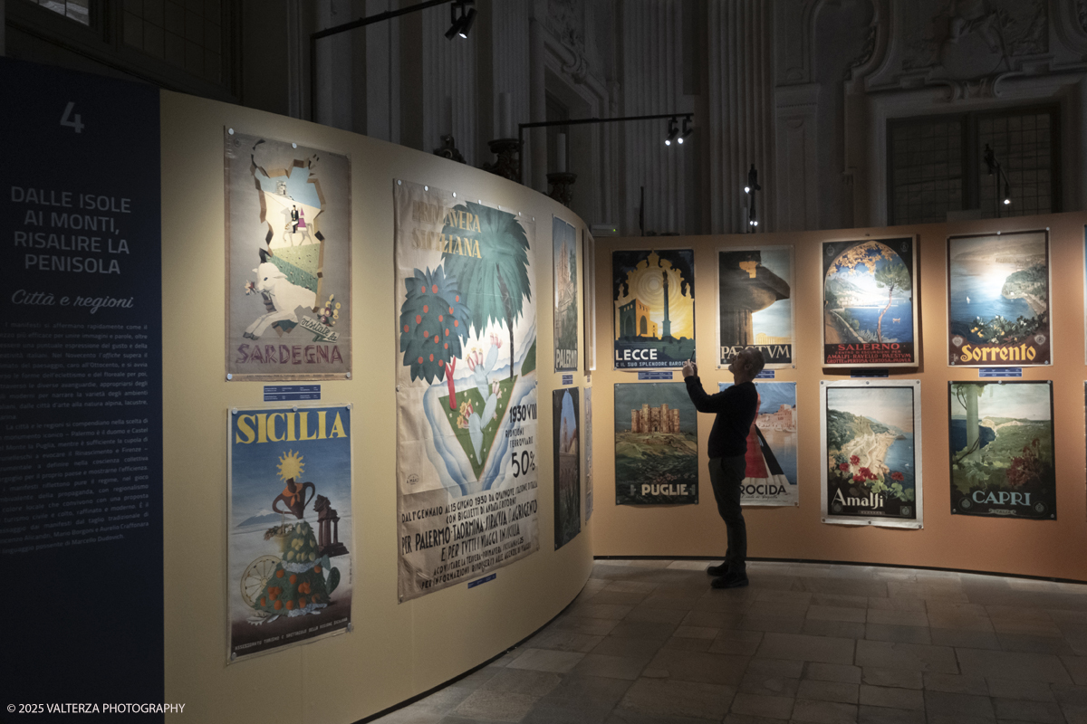 DSCF0050.jpg - Italy, February 12, 2025. Palazzo Madama â€“ Museo Civico d'Arte Antica di Torino presents the exhibition â€œVisitate lâ€™Italia! Promozione e PubblicitÃ  Turistica 1900-1950â€�, an unpublished story on the history of Italian tourism promotion.  Visitor at the exhibition