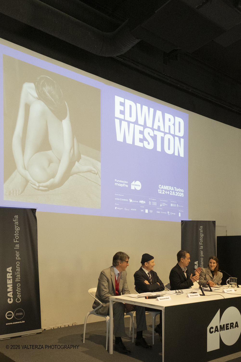 DSCF0834.jpg - 11/02/2026. Torino. CAMERA | EDWARD WESTON. La materia delle forme. Con una selezione di 171 immagini, molte delle quali vintage, il percorso espositivo â€“ curato da SÃ©rgio Mah â€“ si configura come unâ€™ampia antologia che ripercorre tutte le fasi della produzione di Edward Weston (Illinois, 1886 - California, 1958)  Nella foto  un monento della conferenza Stampa con il tavolo dei  relatori Emanuele Chieli Presidentedi Camera.FranÃ§ois HÃ©bel nuovo Direttore Artistico, Sergio Mah Curatore della mostra