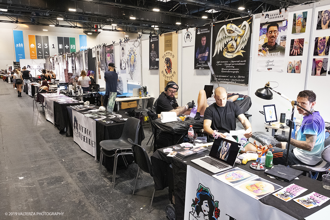 _DSF3709.jpg - 13/09/2019. Torino. Tattoo Convention Ã¨ un evento internazionale che ospita 340 tatuatori provenienti da tutto il mondo, 50 stand degli operatori e fornitori piÃ¹ importanti del settore. Nella foto stand dei tatuatori/tatuatrici