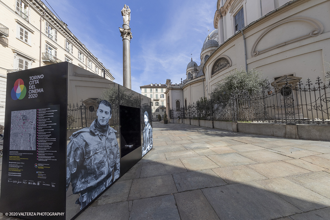 _G3I2901.jpg - 27/02/2020. Torino. Nei punti della cittÃ  dove sono stati realizzati film importanti, sono allestiti supporti di forte impatto visivo e iconografico ( totem) per unâ€™accoglienza immersiva e suggestiva in una Torino â€˜cinema friendlyâ€™. In questo modo 20 luoghi â€˜cinematograficamenteâ€™ significativi come piazze e palazzi del centro cittadino sono le tappe di un percorso che permette di rivivere la storia del cinema torinese attraverso i 20 film piÃ¹ significativi. Nella foto il totem di La Migliore GioventÃ¹. Marco Tullio Giordana nel 2003. Piazza della Consolata.