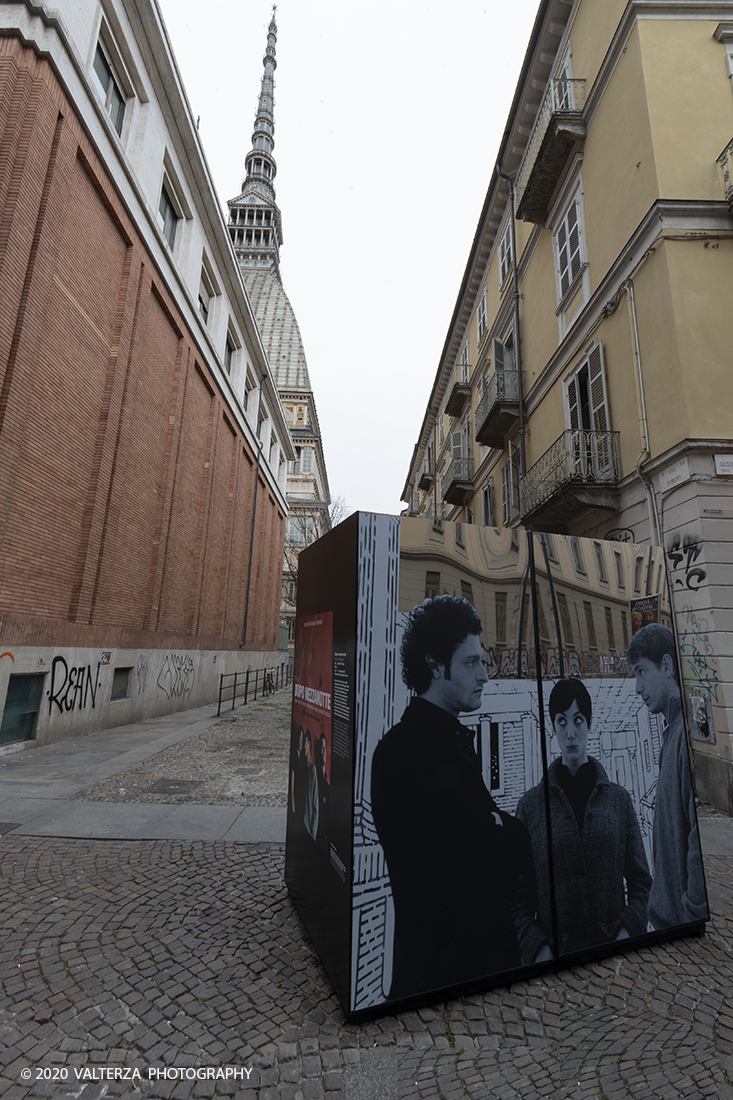 _G3I3035.jpg - 27/02/2020. Torino. Nei punti della cittÃ  dove sono stati realizzati film importanti, sono allestiti supporti di forte impatto visivo e iconografico ( totem) per unâ€™accoglienza immersiva e suggestiva in una Torino â€˜cinema friendlyâ€™. In questo modo 20 luoghi â€˜cinematograficamenteâ€™ significativi come piazze e palazzi del centro cittadino sono le tappe di un percorso che permette di rivivere la storia del cinema torinese attraverso i 20 film piÃ¹ significativi. Nella foto il totem di Dopo Mezzanotte. davide Ferrario nel 2004.Mole Antonelliana/ Via Verdi.